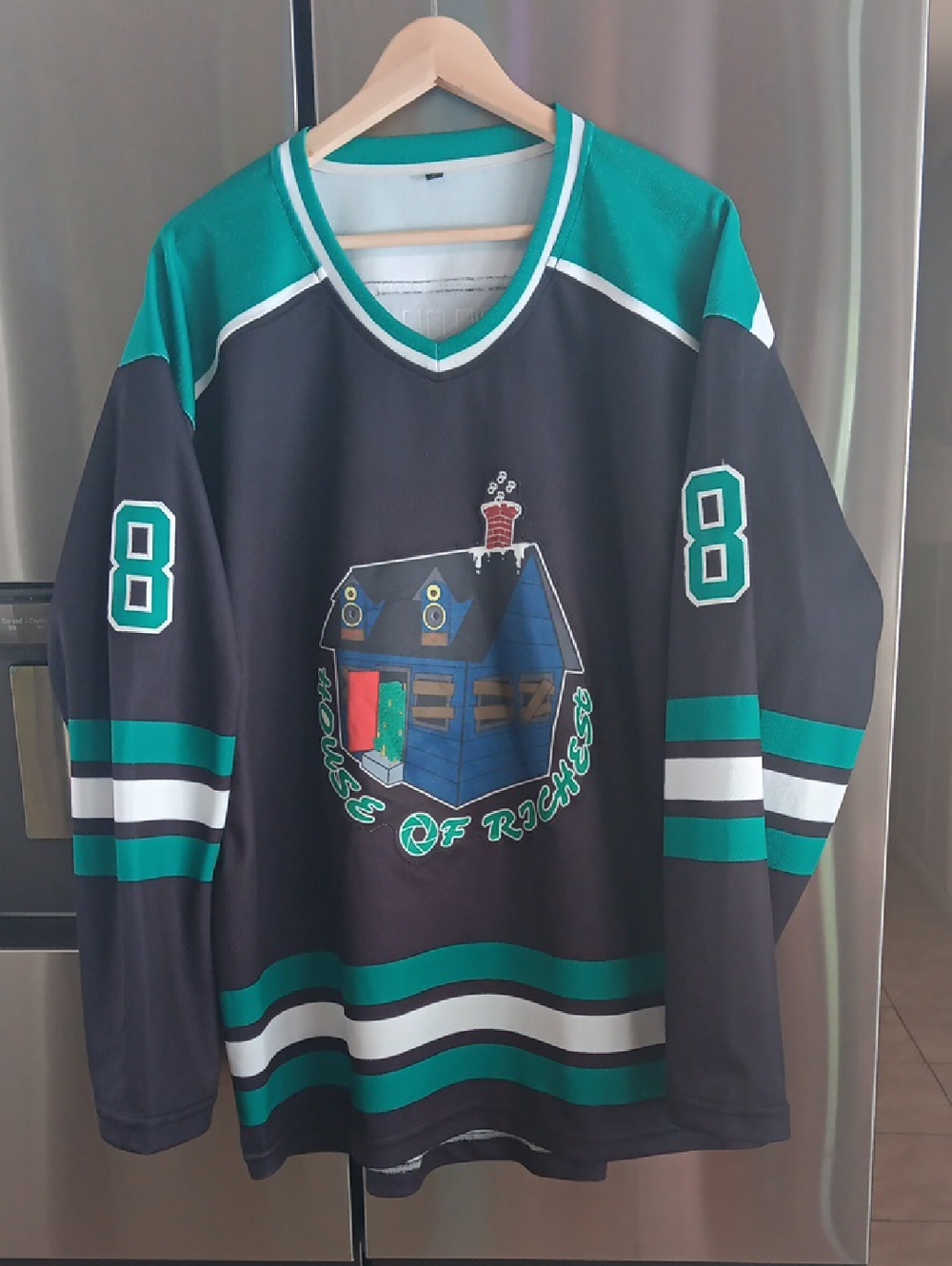 Black & Teal Graphic Hockey Jersey with House Motif